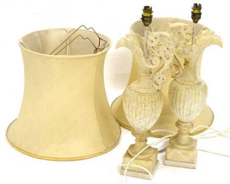 A pair of continental carved alabaster table lamps, each modelled in the form of a ewer, with fluted decoration on square base, 54cm H overall.