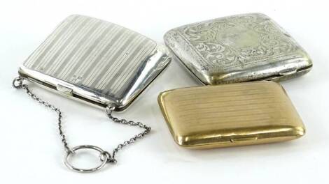 A George V engraved silver purse, with engine turned decoration, 2¼oz gross, a silver plated cigarette case and a brass cigarette case. (3)