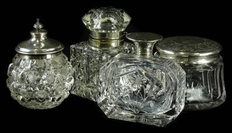 Various silver mounted and silver plate mounted items, to include a scent bottle, two jars and an inkwell. (3)