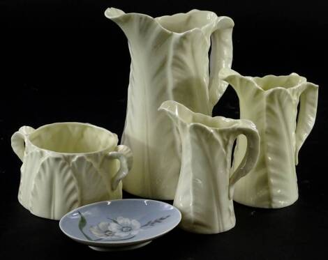 A collection of ceramics, to include three Royal Worcester leaf moulded jugs, a similar milk jug etc.