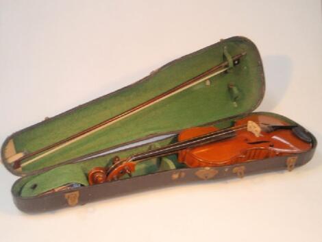 A late 19thC violin with two piece figured back and rosewood pegs