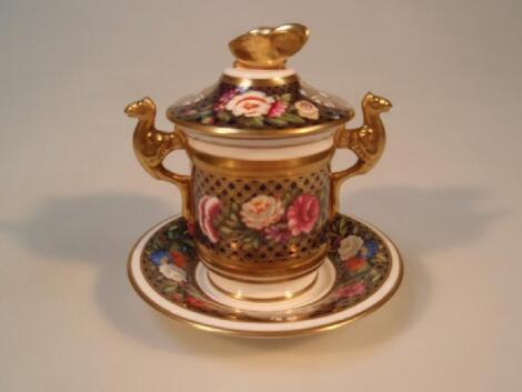 A Spode Regency pattern two handled urn shaped cup and cover with saucer