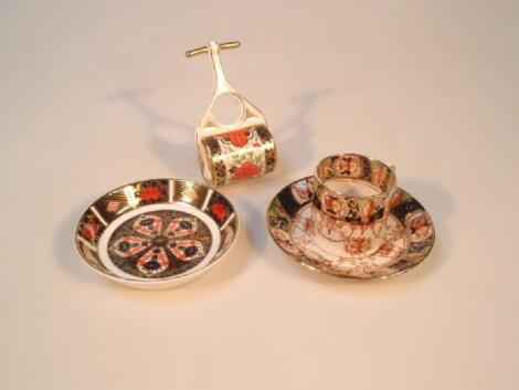 A Royal Crown Derby old Imari pattern circular pin tray