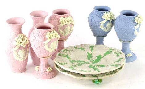 A collection of Victorian parian ware, to include vases and various plates, mostly unmarked.