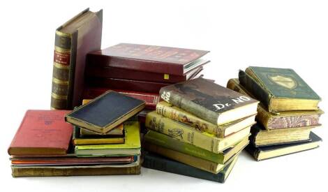 A collection of books, to include volume I of Hooker's Works, various postcards etc.