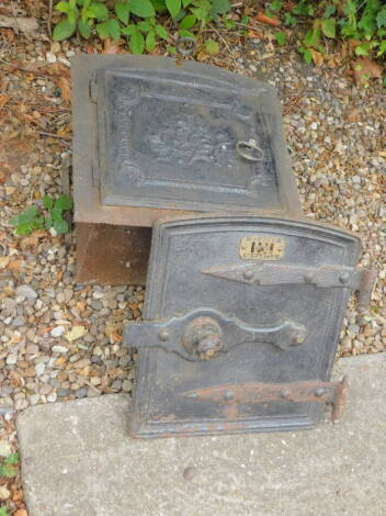 A 19thC cast iron range oven or safe, with brass twist handle, 42cm H, 43cm W and a similar door stamped H Henry Down of Barnard Castle.