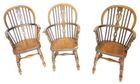 A pair of child's Windsor chairs, each with a pierced splat, and a solid seat on turned legs, and another similar, (AF), (3)