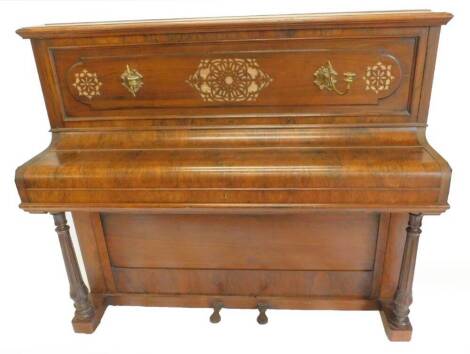 A John Broadwood and Sons of London rosewood case upright piano, with brass candle arms and turned supports, 138cm W.