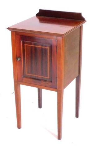 An Edwardian mahogany checker banded bedside cabinet, with single panel door, on square tapering legs, 39cm W.