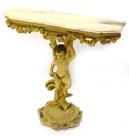 A continental cream and polychrome painted console table, with a pink simulated marble top, above a floral frieze on putto support with circular base, 81cm W.