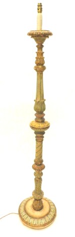 A continental gilt and polychrome standard lamp, with turned decoration, carved with leaves etc., 166cm H.