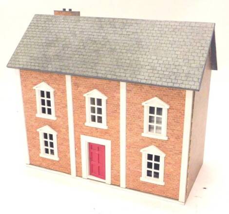 A modern dolls house, and a large quantity of dolls house furniture, 72cm W.