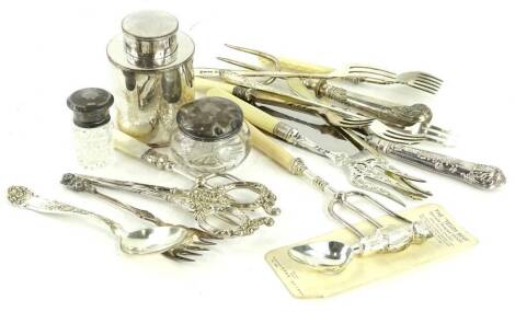 A collection of silver plate etc., to include a Lincoln Imp toasting fork, plated tea caddy, various toasting forks, pickle forks, etc.