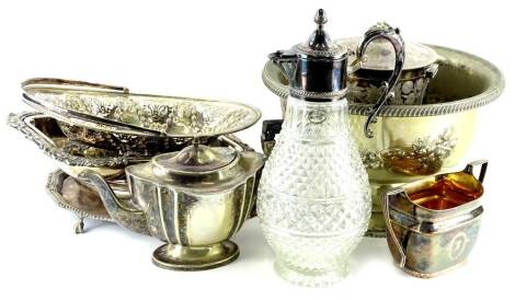 A quantity of silver plate, to include a biscuit barrel, Sheffield plate milk jug, swing handled basket, dish and cover, punch bowl, etc.