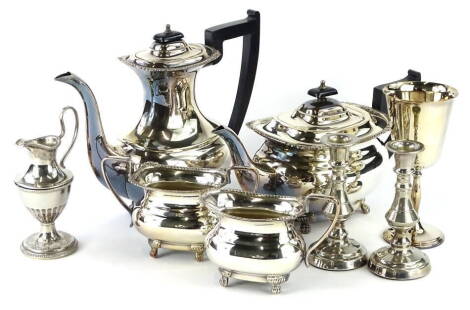 A silver plated four piece tea set, the four piece tea set with composite knops and handles, a pair of candlesticks, etc.