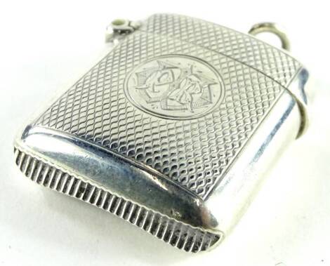 A late Victorian engine turned silver Vesta case, the oval cartouche engraved with a monogram Birmingham 1900 by A and J Zimmerman, 30.8g.