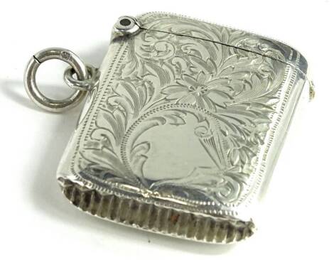 A late Victorian silver Vesta case, with engraved decoration and round a vacant cartouche, Birmingham 1905 by William Gloster, 22.8g.