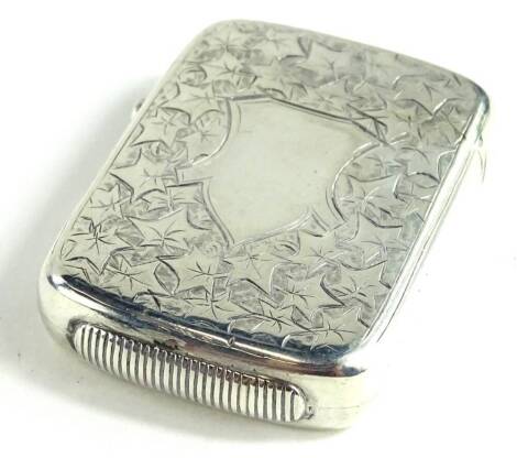 A late Victorian silver Vesta case, engraved with leaves around a vacant cartouche, Birmingham 1883 by George Unite, 28.5g.