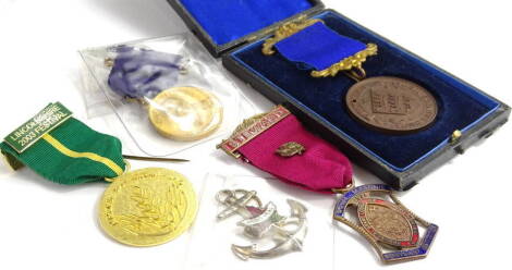 A collection of commemorative medals and fobs, including freemasons, etc. (5 approx)