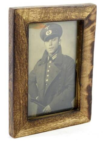 A photograph of a Third Reich Luftwaffe officer, inscribed to the reverse, 14cm x 9cm.