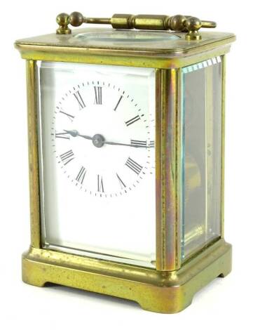 An early 20thC French brass carriage timepiece, with white enamel dial, 13cm H.