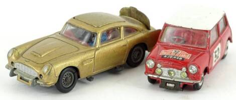 A 1960s Corgi James Bond Aston Martin DB5, and a Corgi mini, both lacking boxes (2)