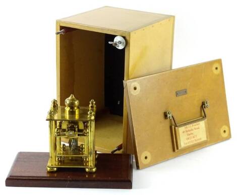 A scratch built brass engineering model, on a mahogany plinth with original box, titled Number 4 2002.