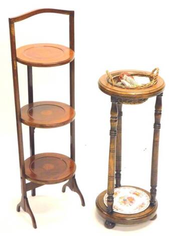 An Edwardian mahogany and inlaid three tier folding cake stand, and a small umbrella stand on bun feet. (2)