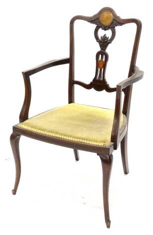 An Edwardian mahogany and marquetry open armchair, with an inlaid carved and pierced splat, a padded seat on cabriole legs.