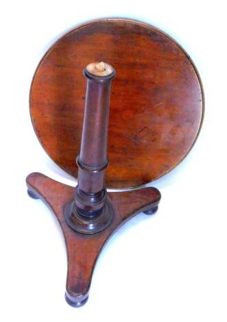 A Victorian mahogany occasional table, the circular top with a moulded edge, on a turned column and concave platform base, 60cm dia (AF).