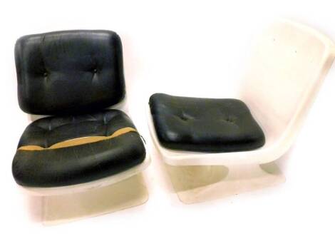 A pair of 1960's white plastic chairs by Albert Jacob for Grosfillex, with brown leatherette cushions. (AF) The upholstery in this lot does not comply with the 1988 (Fire & Fire Furnishing) Regulations, unless sold to a known exporter or upholsterer it wi