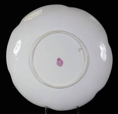 An early 20thC Royal Worcester Frank Roberts plate, handpainted with apples and grapes, with a flared gilt highlighted rim, printed pink marks beneath, 22cm W. - 3