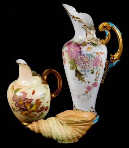 A Royal Worcester ewer, handpainted and raised with flowers, with gilt highlights, shaped handle and bead lined foot, no. 1587, green printed marks beneath, 1900, 24cm H, a Royal Worcester shell no. G716 and a Royal Worcester jug no. 1094. (3)