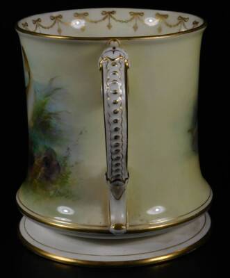 A Royal Worcester porcelain Harry Davis loving cup, the inverted body handpainted with fishes, flanked by gilt highlighted handles with an inner garland banding, on a circular foot, pink printed marks beneath, 1911, 17cm H. - 2