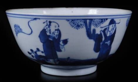 A Chinese blue and white porcelain bowl, of circular form, decorated with many bearded sages, on a circular foot, 12cm Dia.