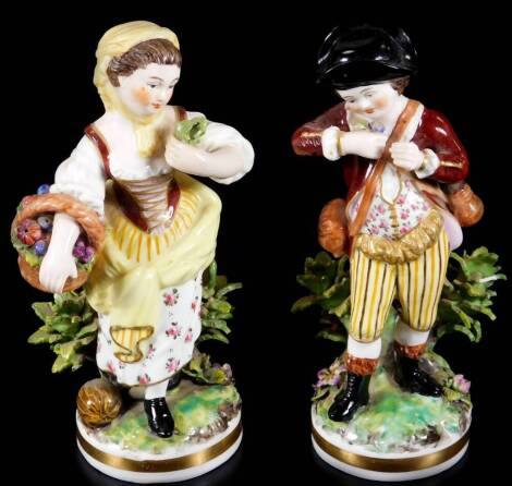 A pair of very early 19thC Derby Porcelain figures, of child gardeners, each decorated in finery with gilt highlights, on a bocage gilt lined base, purple SHD marks beneath, 18cm H. (2)