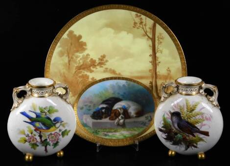 Various 19thC and other porcelain, a Minton's plate decorated with King Charles Spaniels, with a raised gilt border, 25cm Dia., a pair of Worcester flasks, gilt highlighted and decorated with birds to either side, on orb feet, marked beneath. (3)