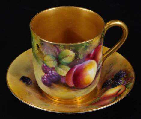 A Royal Worcester George Moseley coffee can, painted with fruit, signed, puce marked, with saucer 11cm Dia.