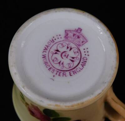 A Royal Worcester blush ivory miniature mug, puce factory mark, c1900, 3cm H - 3