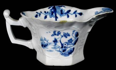 A Worcester hexagonal silver shaped moulded creamer, c1756-58, decorated in blue and white with the Sinking Boat Fisherman pattern, 5cm H.