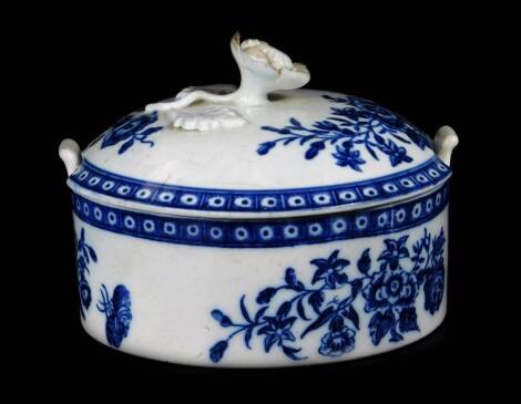 A Worcester blue and white decorated butter tub and cover, c1780, decorated in the Three Flowers pattern 10.5cm Dia