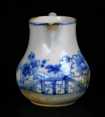 A early Bow Porcelain sparrow jug, c1756, with crabstock handle painted in vivid blue with the Prunus Fence pattern, 7cm H. - 2