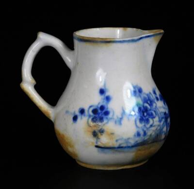 A early Bow Porcelain sparrow jug, c1756, with crabstock handle painted in vivid blue with the Prunus Fence pattern, 7cm H. - 3