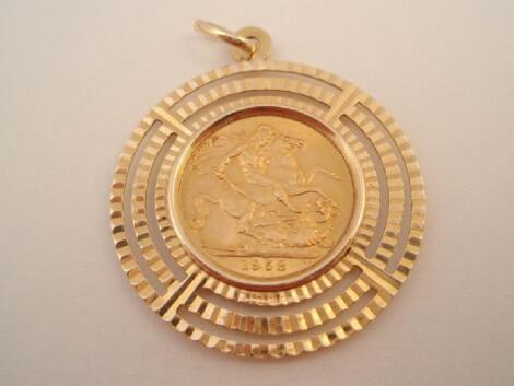 A full sovereign in an 18ct gold pendant mount