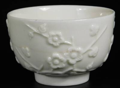 A St Cloud Porcelain or Mennecy Trembleuse tea bowl and saucer, c1748, decorated with moulded stylized blossoms, tea bowl 9cm Dia., saucer 13cm Dia. - 5