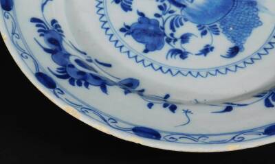 An 18thC Dutch Delft pottery plate, decorated with fruit and flowers, 26cm Dia. - 4