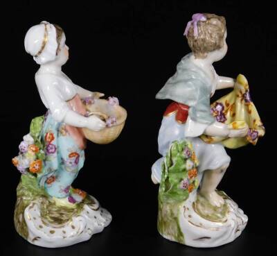 A pair of mid 19thC continental porcelain salt seller figures, of girls holding apron or basket, marked A/R, 12cm H. - 4