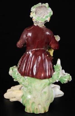 A Derby porcelain figure of a gallant, c1775, holding a basket of flowers, on a rococo base, incised 190 size 2, 12cm H. (AF) - 3