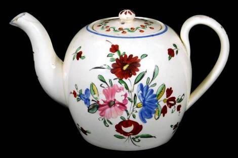 An 18thC Leeds Creamware teapot and cover, c1770, decorated with typical flower groups with a blue line, 10cm H.