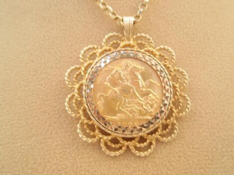 A full sovereign, 1908, in a pendant mount with chain, stamped for 9ct